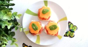 Antipasto di melone, mozzarella e prosciutto crudo Antipasto di melone, mozzarella e prosciutto crudo